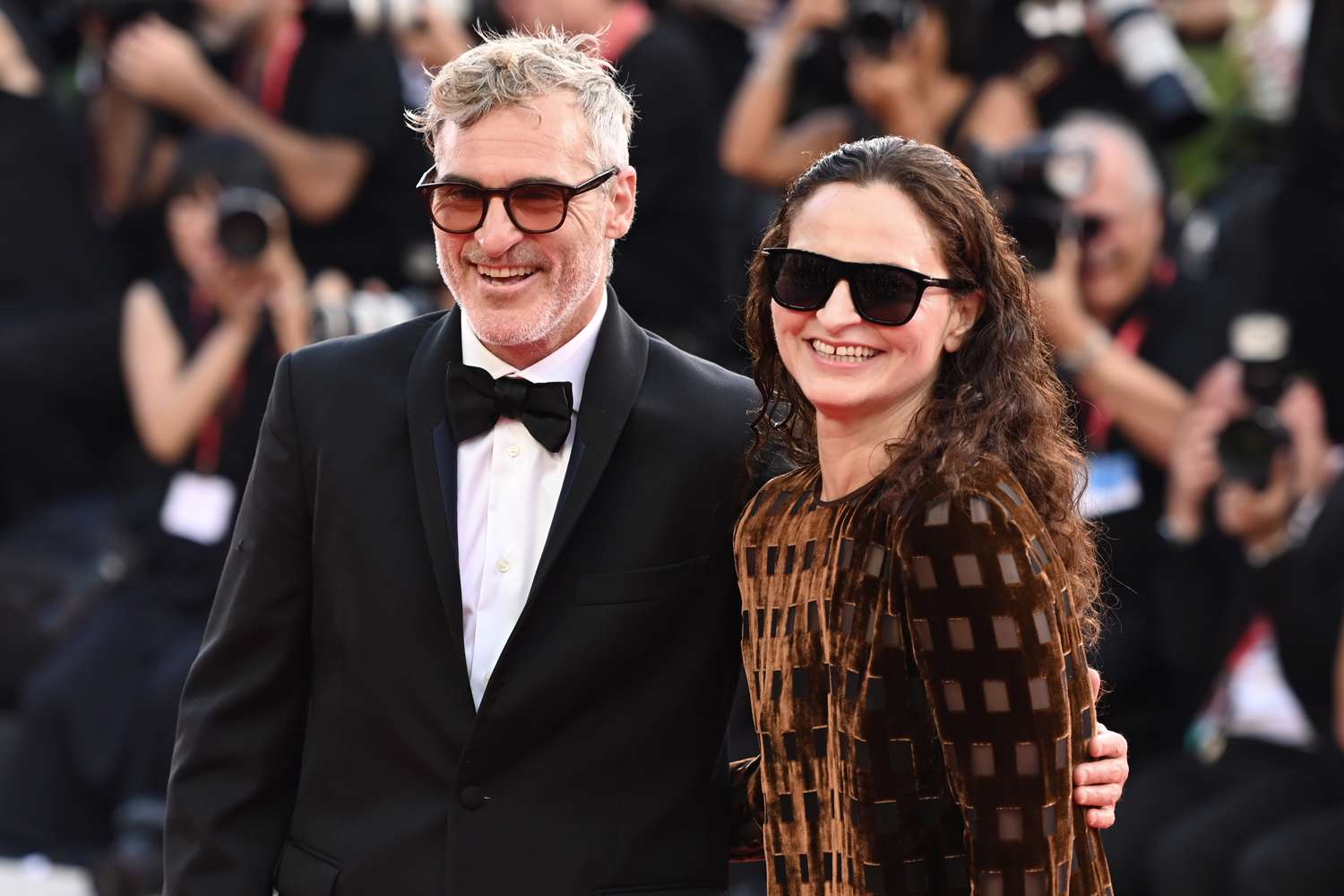 Joaquin Phoenix and Sister Rain Phoenix Smile Together in Rare Appearance at Venice Film Festival