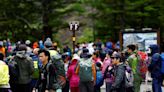 Japan imposes new fees on Mount Fuji climbers to limit tourists