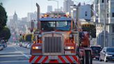 Watch: deranged tow truck driver attempts to hook moving car in San Francisco