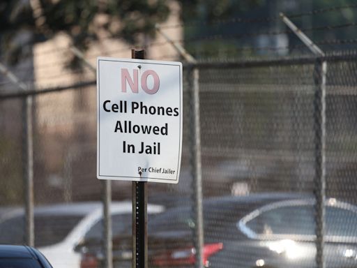 An FCC ruling has cut prison phone bills in half, disrupting the correctional telecommunications industry