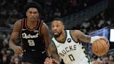 Damian Lillard scores 34 points as the Bucks beat Pistons 120-118; Giannis ejected in 3rd period