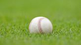 Fan on the field at Reds game nearly backflips his way out of security’s grasp