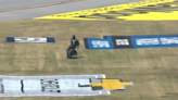 NASCAR Crew Member Chases Loose Tire Into Infield, Immediately Loses Hard Card