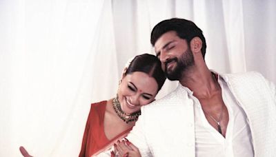 Sonakshi Sinha and Zaheer Iqbal listen to Shah Rukh Khan's voice note in fresh wedding photos