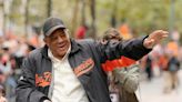 Willie Mays, former San Francisco Giants great, waves to the crowd along the parade route during the San Francisco Giants World Series victory parade on Oct. 31, 2012...
