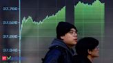 Japan's Nikkei closes at one-month low on mixed US tech earnings, yen rally - The Economic Times