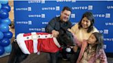A United captain adopted a puppy who was abandoned at a San Francisco airport, giving him a new home