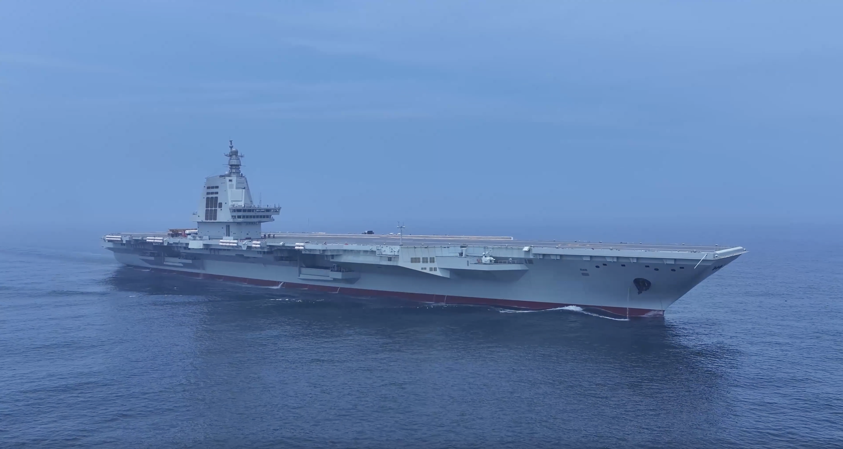 China flexes new aircraft carrier muscles