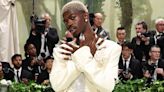 Lil Nas X Rocks Sparkly Suit, Blond Hair and Extra-Long Acrylic Nails for 2024 Met Gala