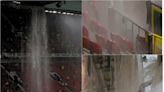 'World famous' Old Trafford waterfall sends fans running as rain deluge hits Manchester United's home