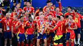 Soccer-Sublime Spain strike late to win record fourth Euro crown