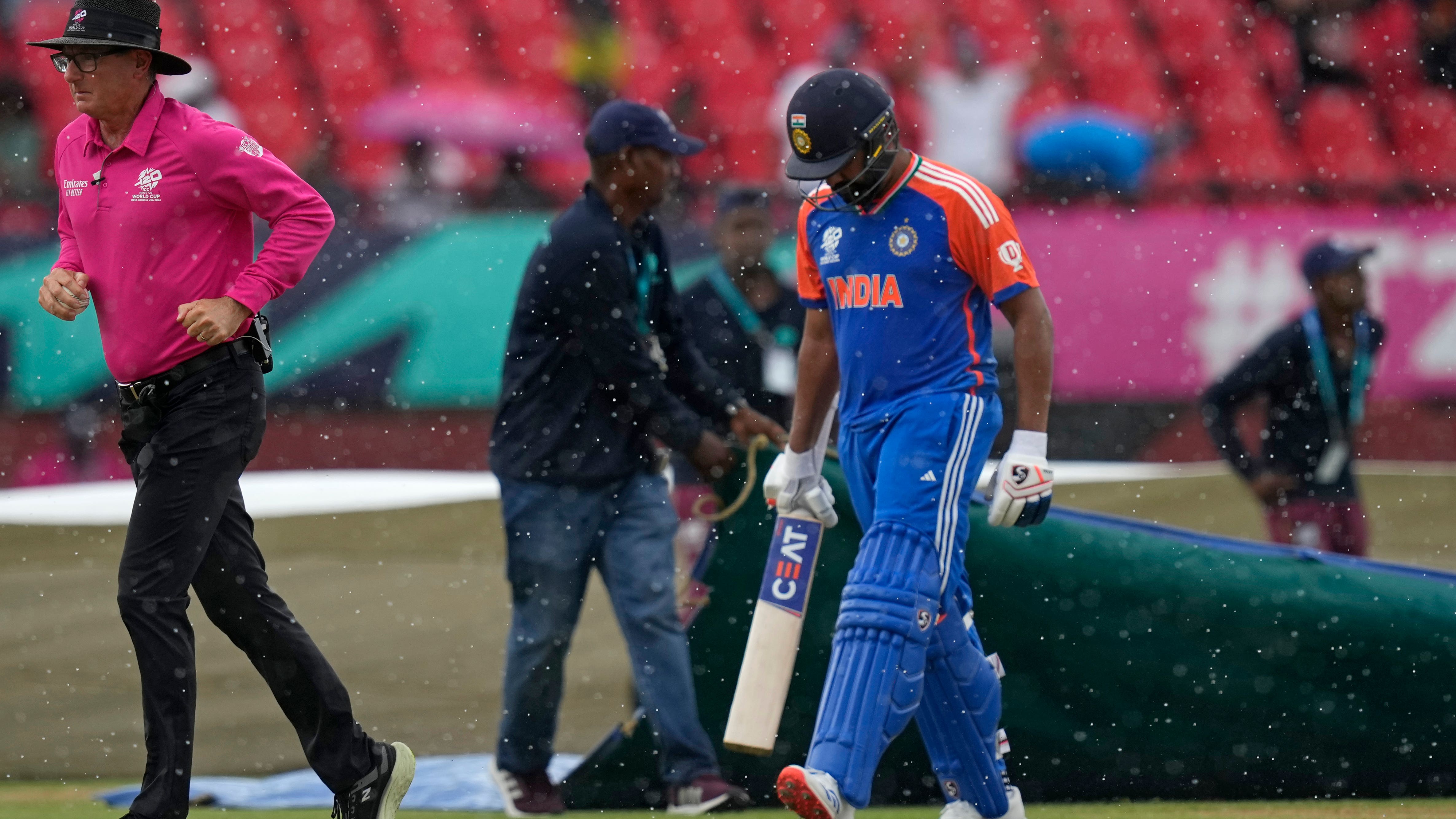 England hampered by rain after taking two early India wickets