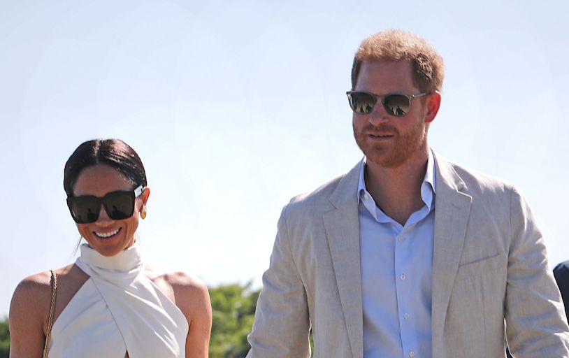 Prince Harry's reaction to Meghan kissing teammate goes viral