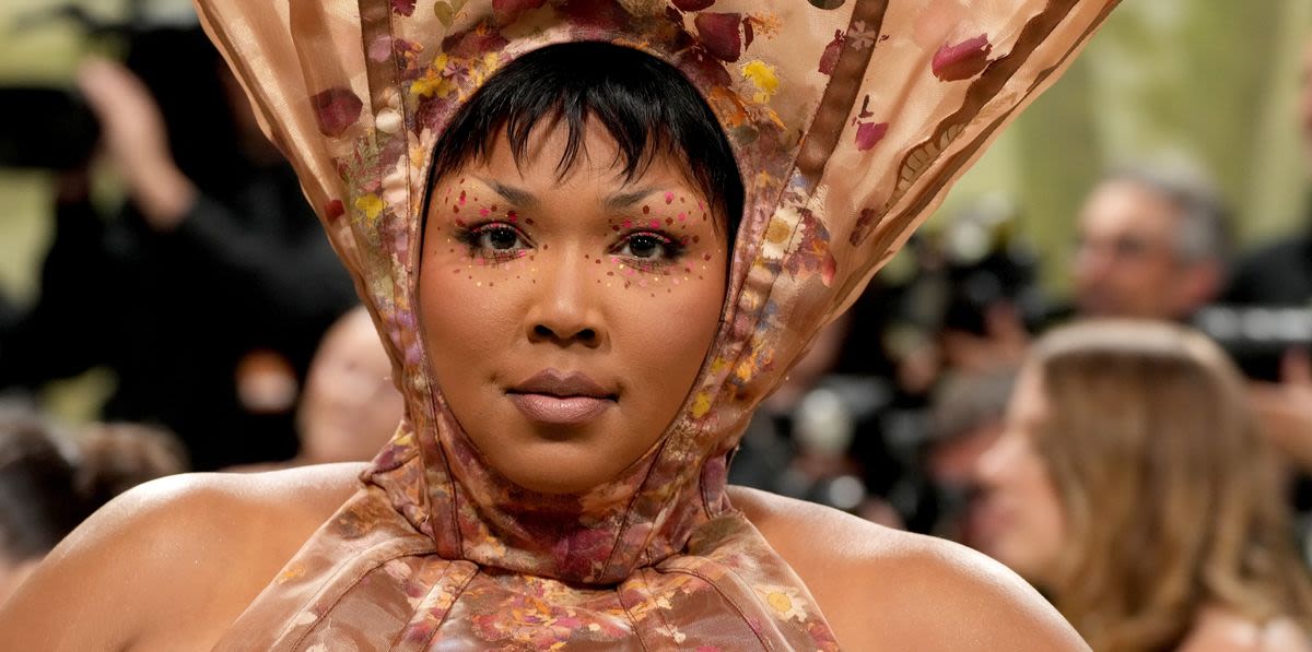 Lizzo Calls Critics ‘Fatphobic’ After Met Gala Outfit Compared To Foreskin, Menstrual Cups