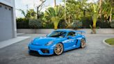 A Shark Blue Porsche Cayman GT4 Could Be In Your Garage For Just $25