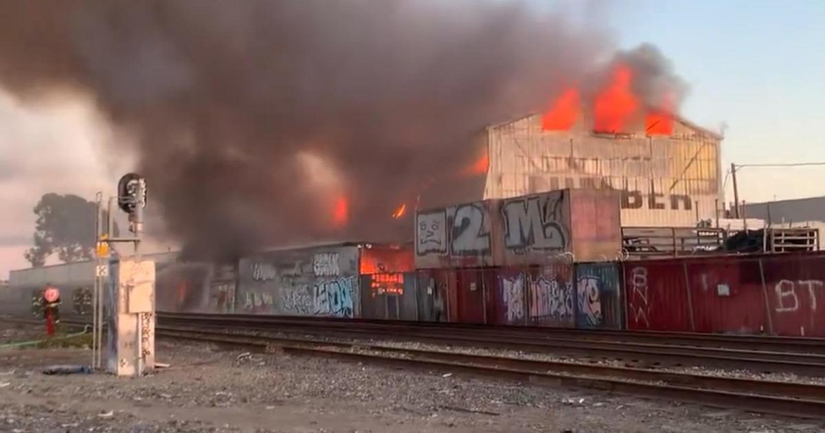 Oakland firefighters battle 4-alarm fire that broke out at lumber yard