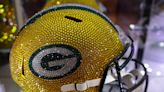 A $10,000 Swarovski crystal-covered helmet and pieces of the original Lambeau Field fence railing are among the more unique items at the Packers Pro Shop