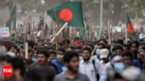 Bangladesh relaxes curfew as unrest recedes following deadly protests: Latest developments - Times of India