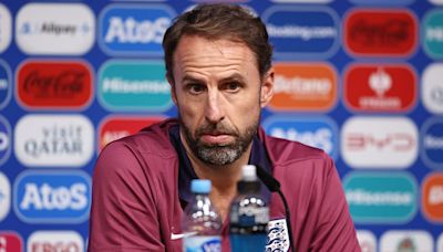 England fans serenade German police officer and Southgate LOOKALIKE