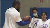 SBH Health System teams up with Giants star at youth football camp