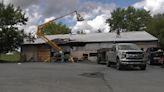 Restoration crews secure fulfillment center in Upper Macungie, after fire tore through building