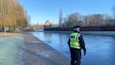 Boys warned to stop smashing ice on frozen lake with scooter