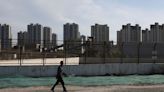 China's home prices dip for 4th month, may weaken further