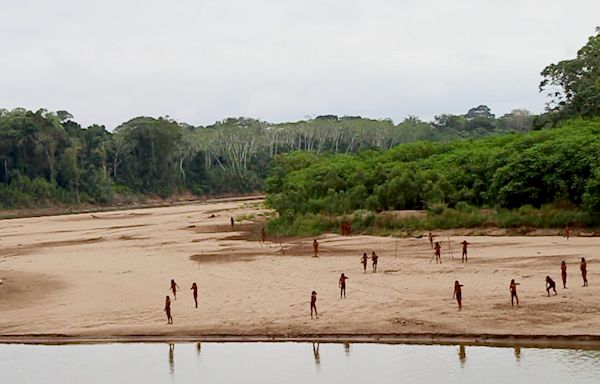 A rarely seen Amazon tribe emerges from rainforest as loggers move in