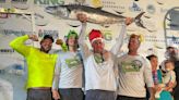 Who is king of the beach? This team of Gulf fisherman landed a near 50-pound kingfish