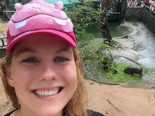 She’s obsessed with baby pygmy hippo Moo Deng. So she flew across the world to see her