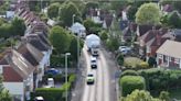 Watch: Police escort wide load blocking main road