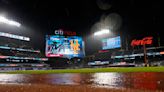 Marlins rally in 9th inning to take 2-1 lead over Mets before rain causes suspension
