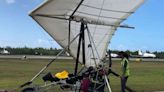 Cuban migrants fly into Key West airport on motorized hang glider