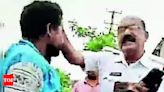 Cop slaps truck driver for parking in no-parking zone | Hyderabad News - Times of India