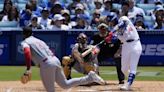 Shohei Ohtani delivers a walk-off single in the 10th inning of the Dodgers' 3-2 win over Cincinnati