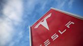 JPM sees risk of further negative earnings revisions for Tesla By Investing.com