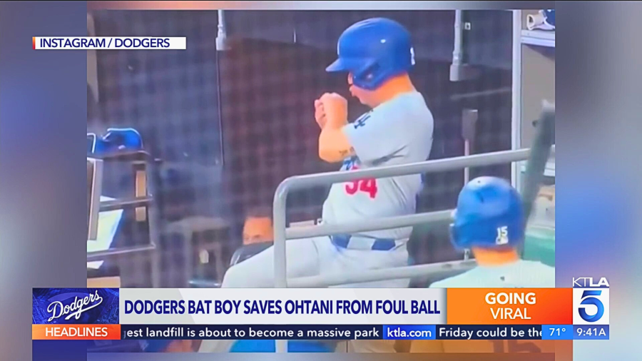 Dodgers bat boy saves Shohei Ohtani from foul ball