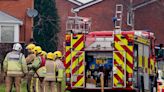 Blaze at former cinema being tackled by12 fire crews - road and shopping centre closed