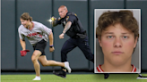 The Source |SOURCE SPORTS: [WATCH] Fan Tased, Arrested For Running On Field, Doing Backflip During Guardians vs. Reds Game