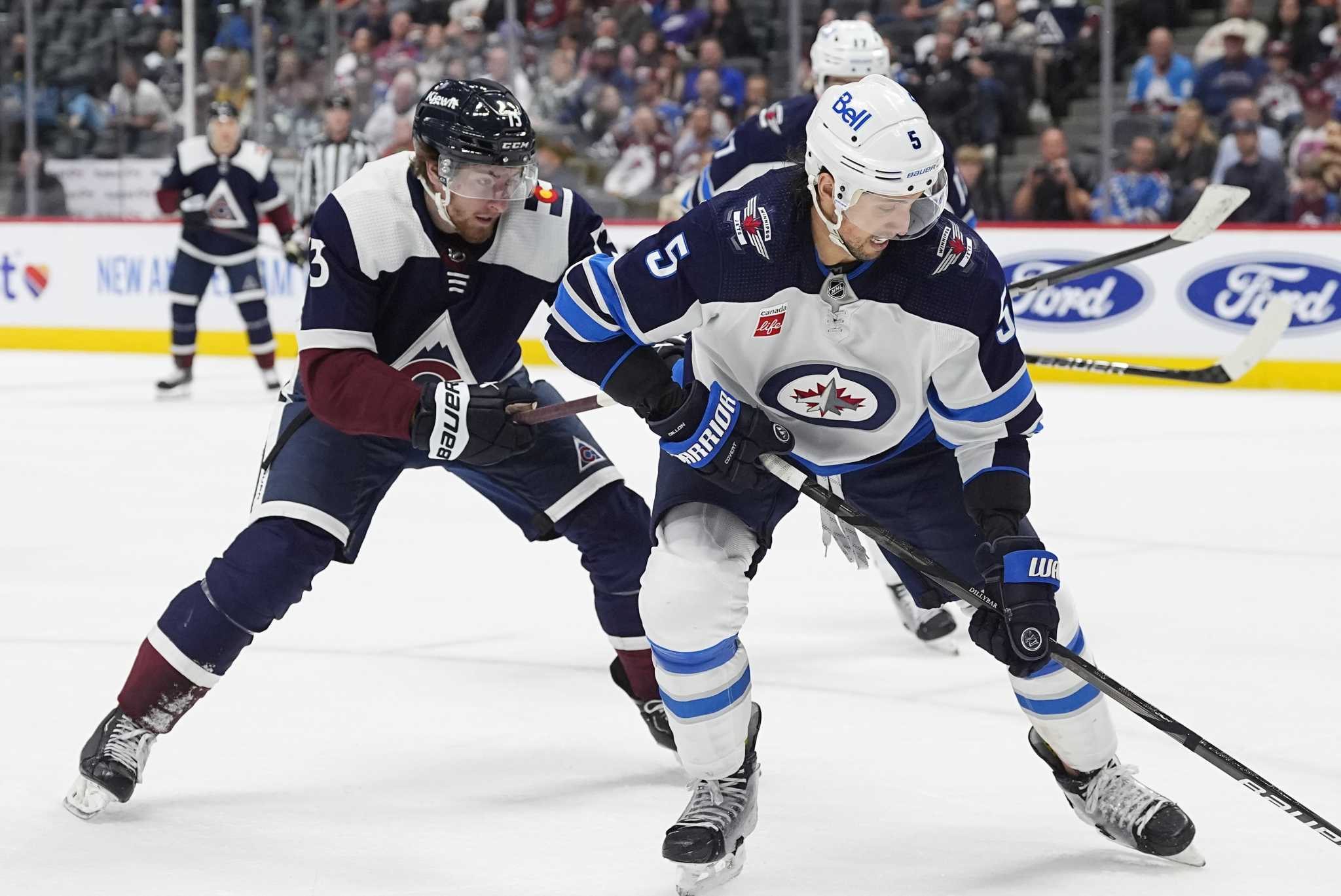 Jets' Brenden Dillon day-to-day after receiving stitches on hand for apparent cut from skate blade