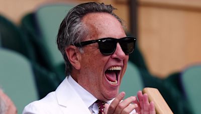 Richard E. Grant puts on a VERY animated display at Wimbledon