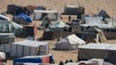 Palestinians' makeshift tents and a tent with the logo of World Central Kitchen in Rafah in the southern Gaza Strip on April 4, 2024