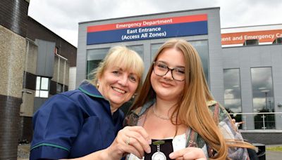 Award-winning nurse passes on watch to niece, 18, set to follow in her footsteps