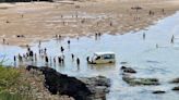 Tourists rush to save ice cream van washed out to sea in Cornwall