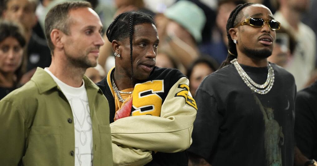 Grammy nominated rapper Travis Scott dons Sand Springs letterman jacket at Paris Olympics