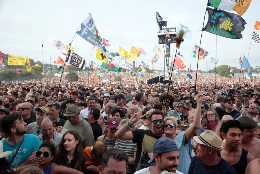 Banksy behind inflatable 'crowdsurfing' migrant raft at Glastonbury