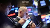 Wall St gains ahead of Fed officials' remarks; Dow nears 40,000 mark