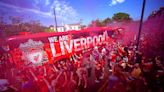 Liverpool fans greet the team bus ahead of Jurgen Klopp's final match