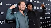 Devotion Stars Glen Powell and Jonathan Majors First Met While 'Completely Naked' in a Bathhouse