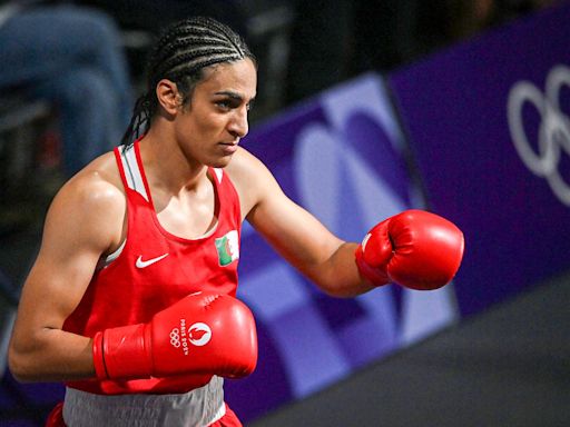 Boxer Imane Khelif guaranteed a medal as IOC condemns questions about her gender identity